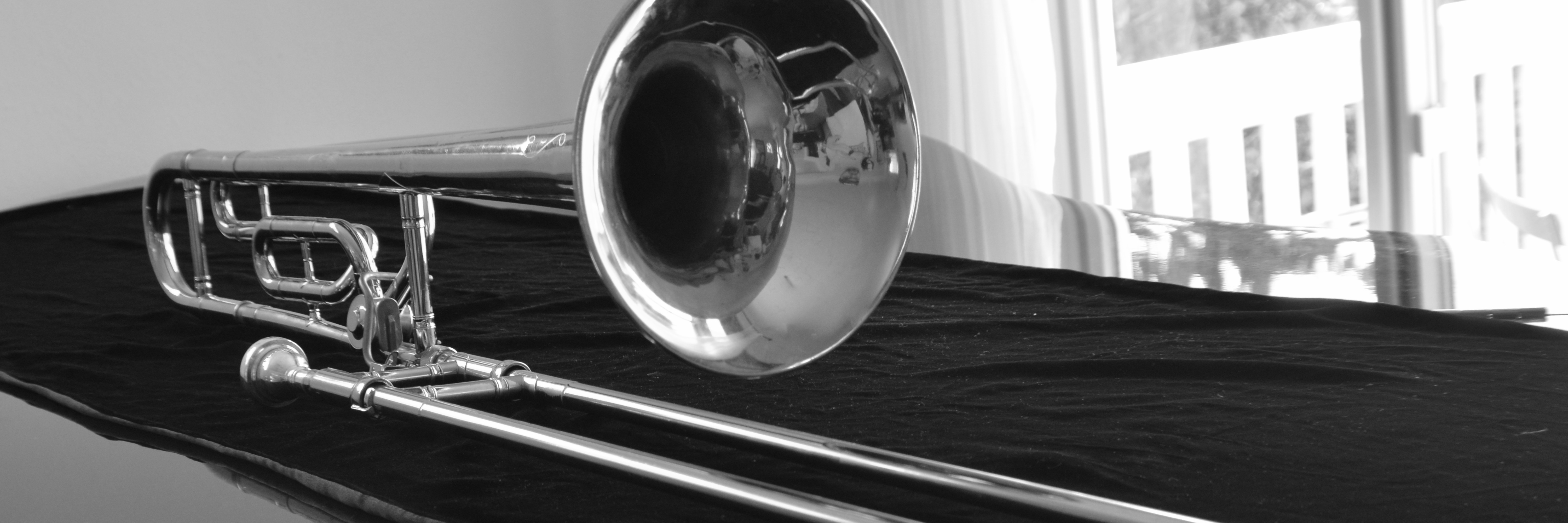 Image: Trombone on baby grand piano